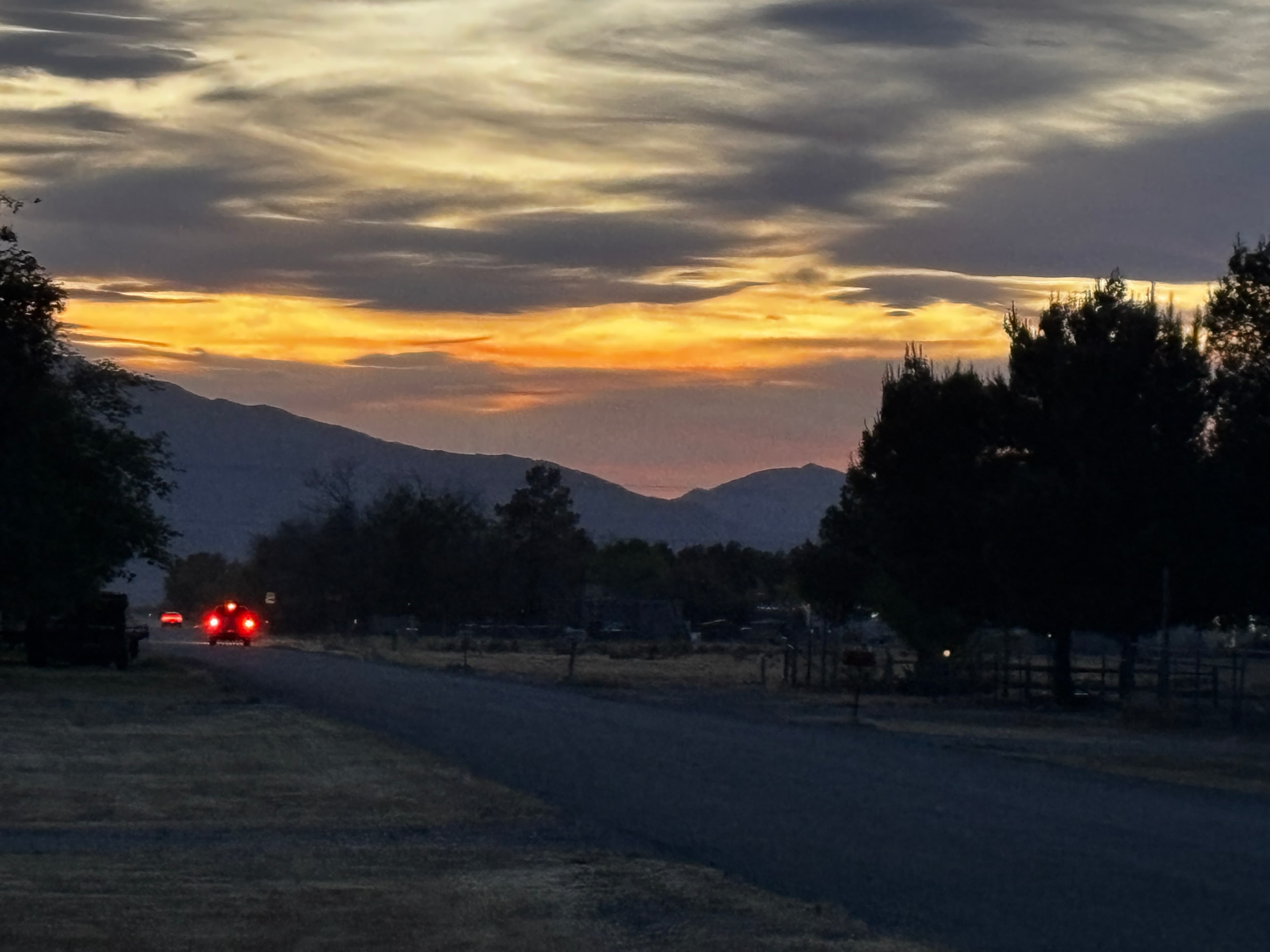 Sunset over a mountain road