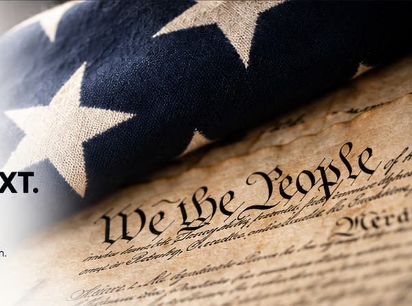 American flag resting on a historic document